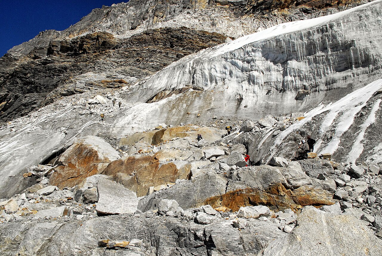 Sergey Pashko · CC BY 3.0 · https://creativecommons.org/licenses/by/3.0 · https://commons.wikimedia.org/wiki/File:MERA_Pass,_beginning_the_ascent_on_the_glacier._-_panoramio.jpg · Displayed cropped to fit · Displayed cropped to fit The glacier approach at Mera La, illustrating high-mountain terrain.