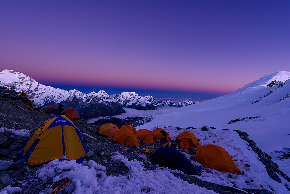 Pravin Mishra · CC BY-SA 4.0 · https://creativecommons.org/licenses/by-sa/4.0 · https://commons.wikimedia.org/wiki/File:Mera_Peak_High_Camp.jpg · Displayed with a crop to fit · Displayed cropped to fit High camp on Mera Peak, illustrating expedition preparation.