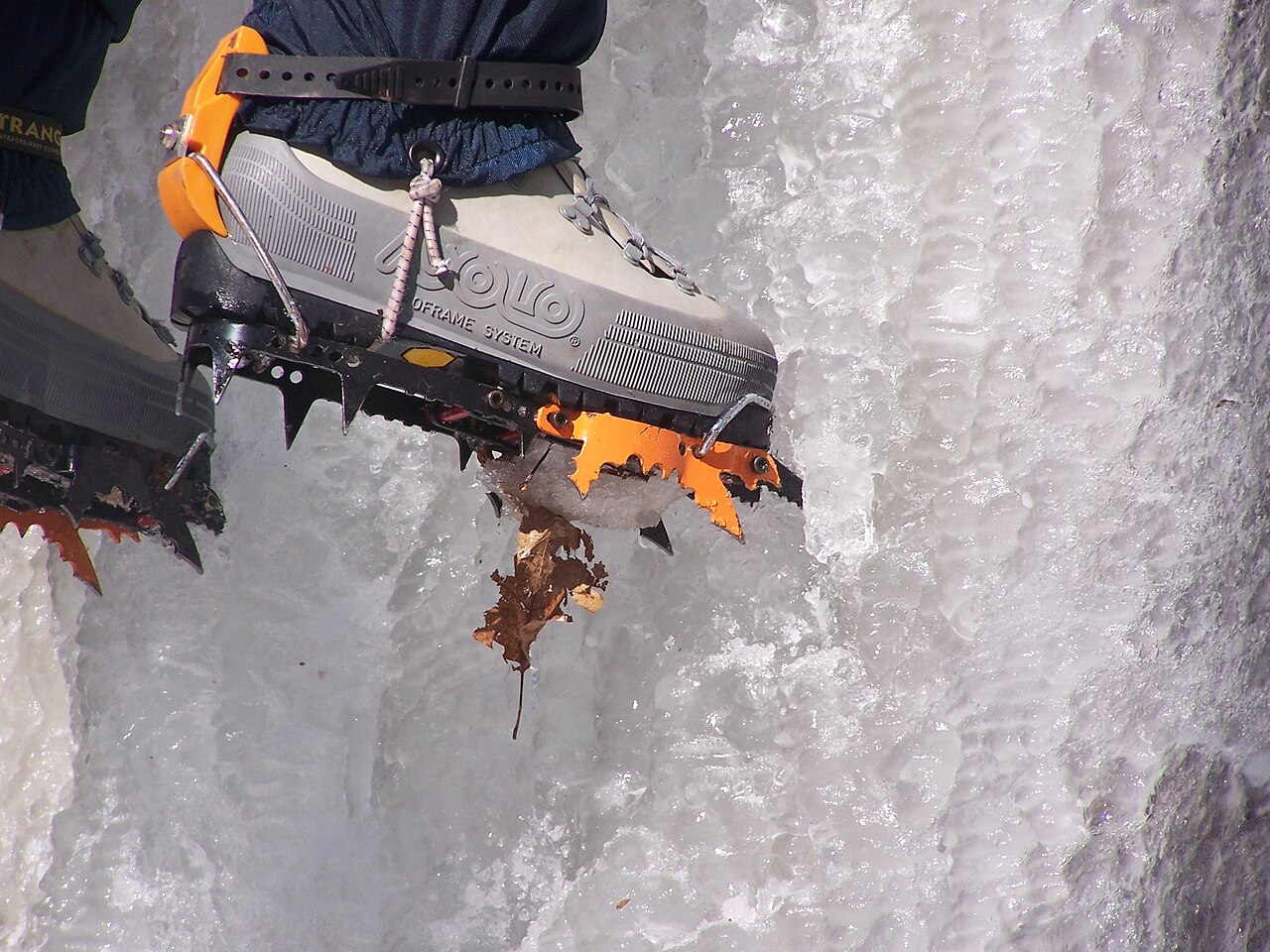 Dbaisley at English Wikipedia · Public domain · https://commons.wikimedia.org/wiki/File:Crampon.JPG · https://commons.wikimedia.org/wiki/File:Crampon.JPG · Displayed cropped to fit A close view of crampons fitted to mountain boots on hard snow and ice