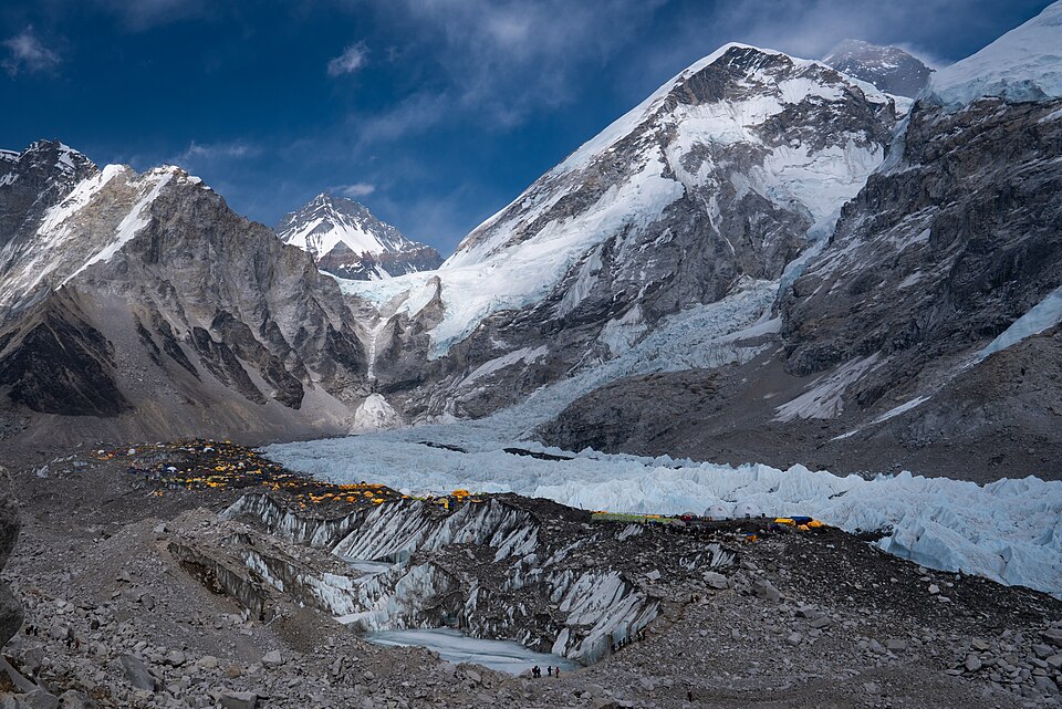 Yellow expedition tents at Everest Base Camp beside the Khumbu Icefall, Nepal